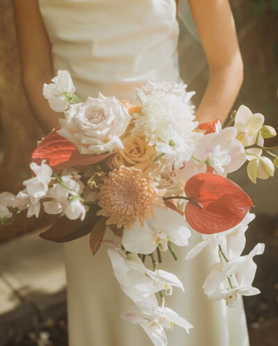 bride and groom hugging