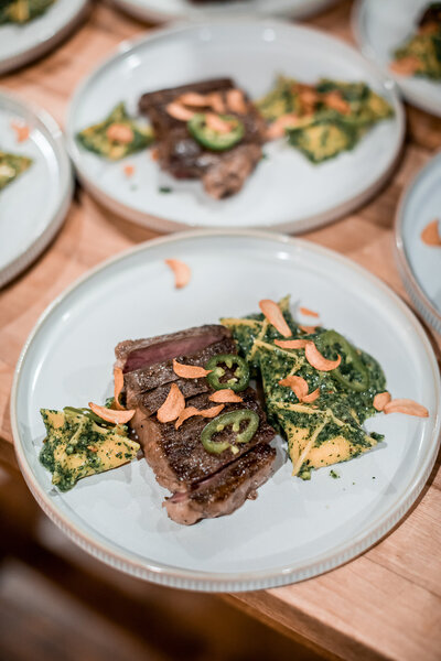 Gourmet steak dinner with herb pasta prepared at Fowl Plains waterfowl hunting lodge.