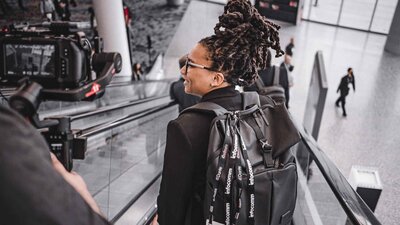 Alesia Hendley looking at a camera man