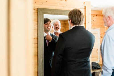 groom getting ready at twin willow gardens snohomish wedding venue