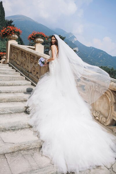 Bride in wedding dress at scenic Lake Como Italy