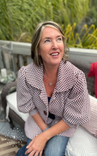 Laura Kate McHugh with an open, hopeful expression — a supportive guide for subconscious healing and personal growth