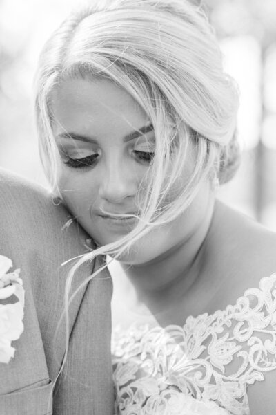 mother of the bride and maid of honor fluffing brides veil at the Ledges in Huntsville Alabama