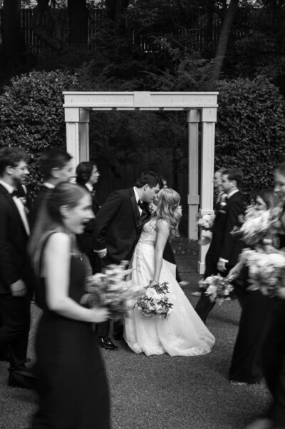 Bride and groom walk up memorial steps at their DC wedding