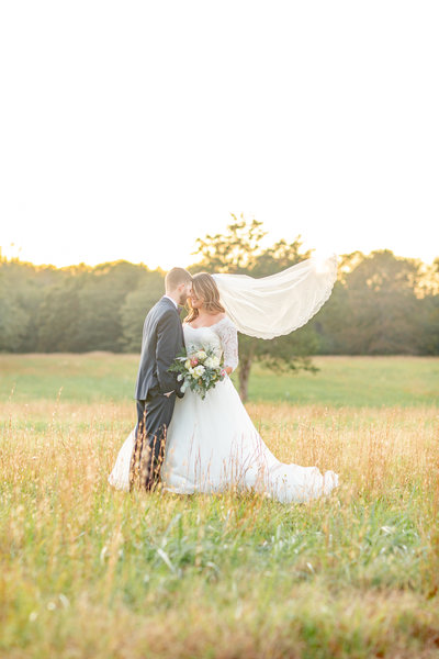 Bride and groom walk up memorial steps at their DC wedding