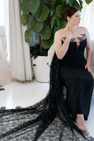 Black wedding dress with detachable lace train and illusion neckline