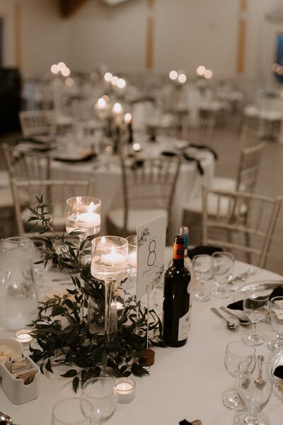 Wedding table with candles and florals