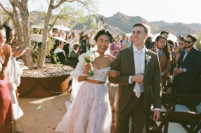 Bride and groom after saying i do at the ceremony of luxury desert wedding in Joshua Tree