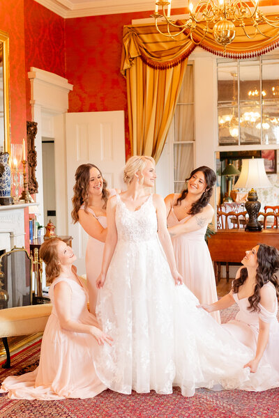 A bride and her bridesmaids get ready for a wedding at Antrim 1844 with Maryland wedding photographer