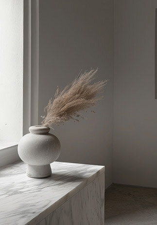 Elegant bouquet of pale blush peonies held by person in black - Baer Brand Studio aesthetic