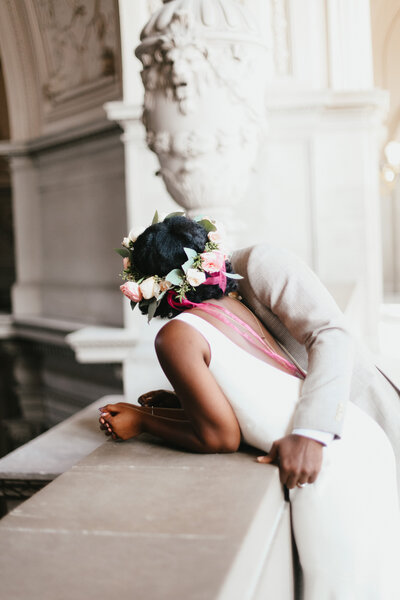 Bride and groom have private moment at San Francisco City Hall before eloping