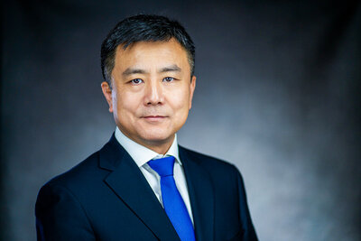 Polished headshot for company website, New Jersey professional photographer Alex Kaplan.
