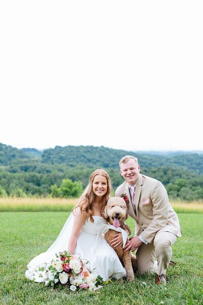 Bride glancing out window waterstone venue johnson city wedding photographer
