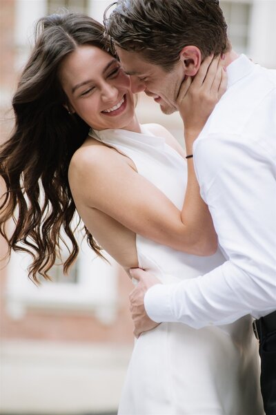 Ottawa engagement photographer captures candid moment during session Downtown Toronto.