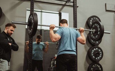 Athlete receiving targeted treatment to recover from sports-related injury and improve performance