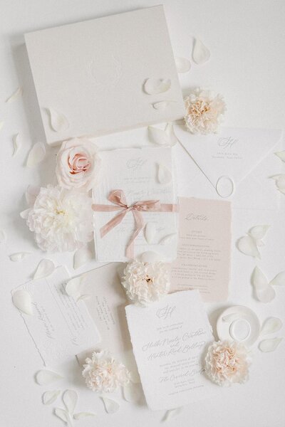 Wedding stationery flat lay | CM Promotions serving Dallas and Fort Worth brides and grooms