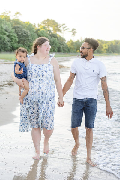 Family walking on the beach together