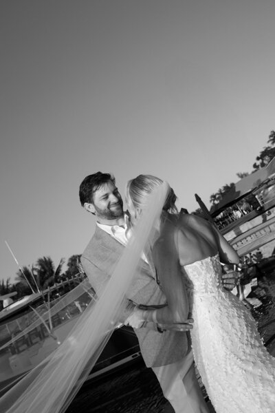 black and white photo of couple looking at each other