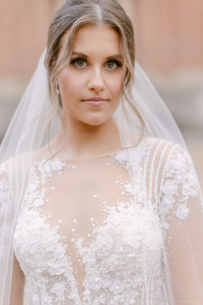 Bridal portrait of a bride wearing a lae wedding dress
