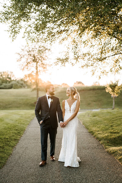 New Jersey wedding couple looking at each other in a park