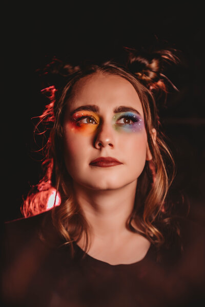 Bright rainbow makeup and photography done by Lucid Dreams 