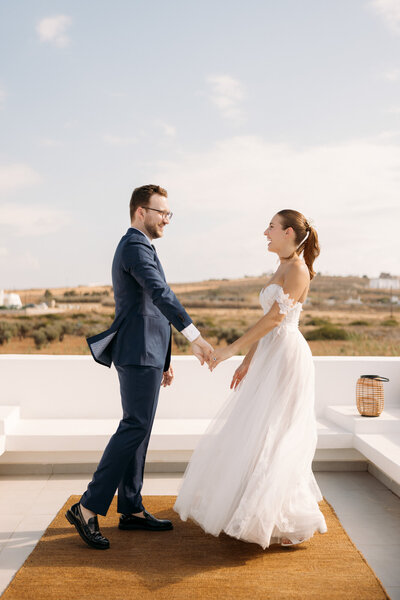 First Look of the couple Paros island wedding - Nikos Pandazaras Luxury Wedding Photographer 