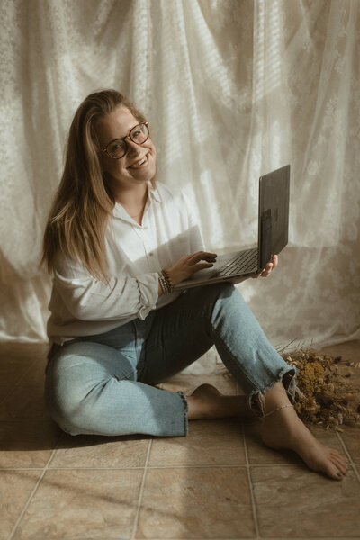 Brittany Fitch, the woman behind Larks Atelier, a luxury design studio for wedding creatives.