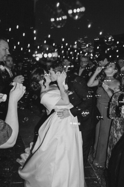 bride posing  with groom