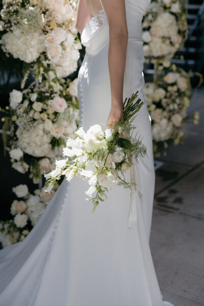 bride dress details captured in floral background coordinated by AK Events Co