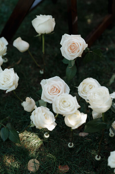 Exquisite wedding florals, featuring lush arrangements and elegant bouquets, captured in fine art photography at a luxury destination wedding.