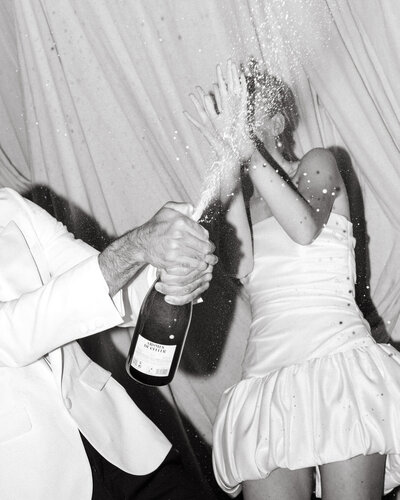 Candid moment of bride and mother captured by Oahu wedding photographer.