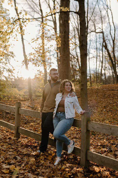 engaged couple in field
