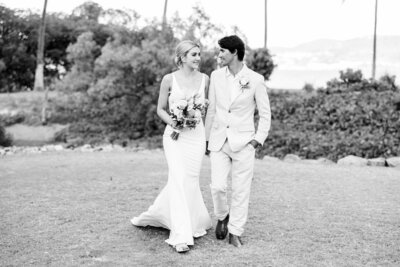 bride and groom walking during their bridal portraits in the whitsundays.