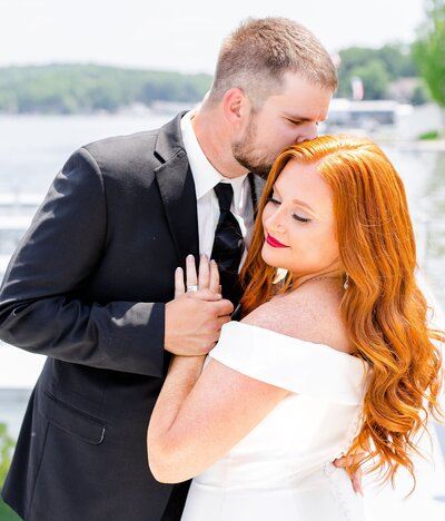 couple in front of hydrangeas