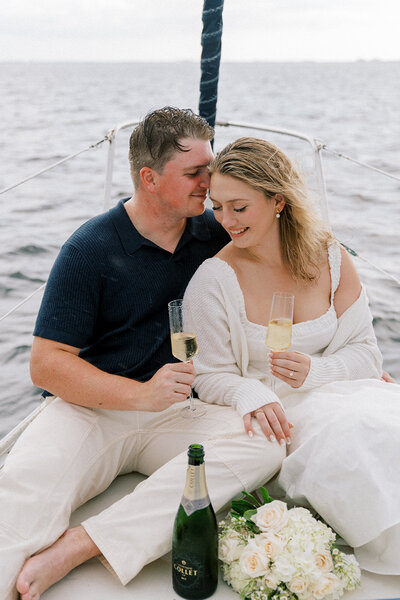 engaged couple holding hands and smiling