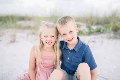 Karen Schanely's son and daughter pose together on Charleston beach.