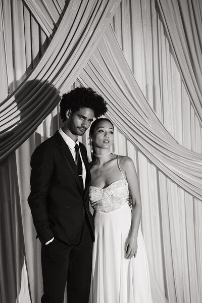 Floral ceremony arch inside Central Park Boathouse in New York City — editorial wedding photography capturing atmosphere and design details.