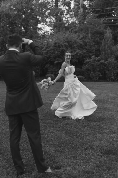 Fun moments for the bride and groom after their wedding while the bride is holding her umbrella