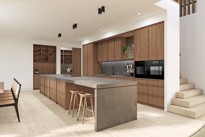 A spacious kitchen and dining area in Thalassa – Newport, featuring warm timber cabinetry, a large island bench with stone countertops, pendant lighting, and an integrated dining space.