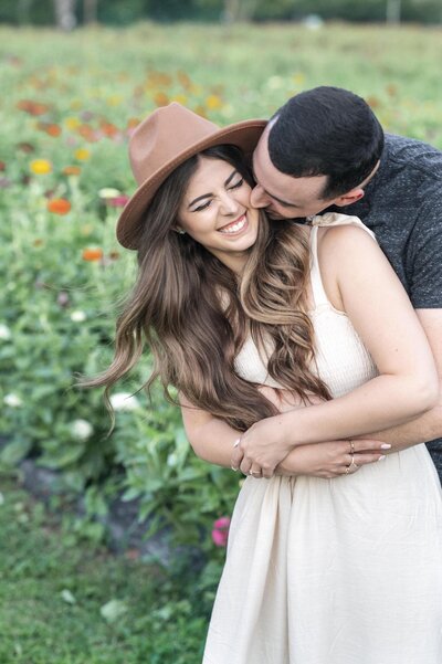 Engagement session in wildflower field