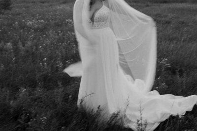 black and white image bride in field