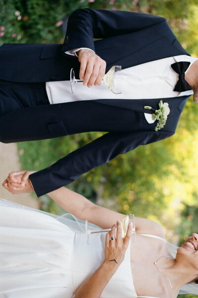 Bride and Groom holding hands during their timeless Texas wedding planned by Austin Wedding Planner, Everlasting Events