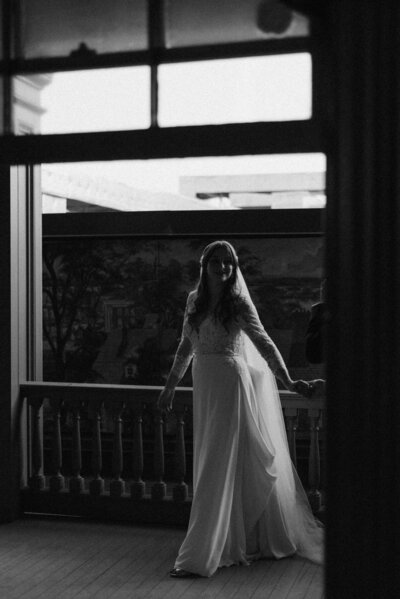 Bride posing for a stunning wedding portrait in Richmond, VA before the ceremony.
