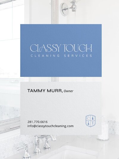 Double-sided business card for the owner of Classy Touch Cleaning Services. Features embossed logo in blue and crest favicon for a refined, upscale finish.
