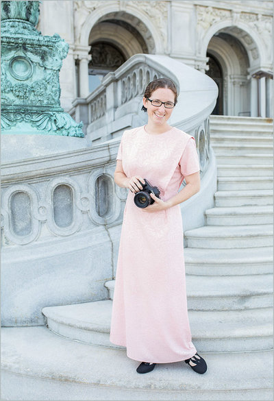 Photographer on monument steps, DC