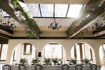 Gorgeous Colorado European-inspired wedding venue, Villa Parker, reception setup with the sun beaming in