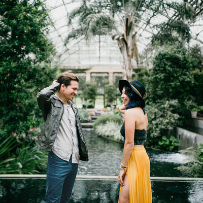 Stylish couple photographed inside Longwood Gardens, photography by Sweetwater Portraits.