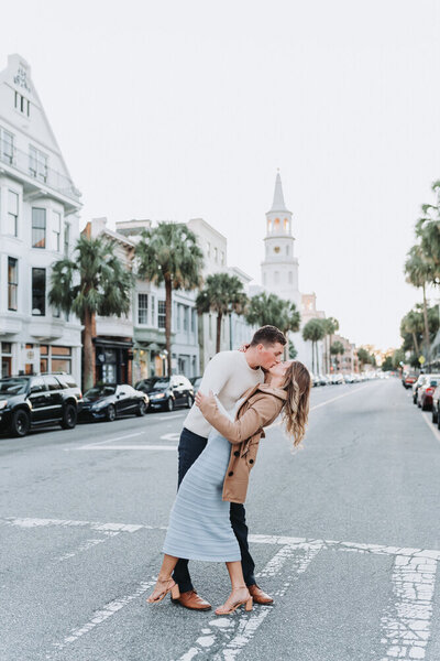 man hugging woman from behind