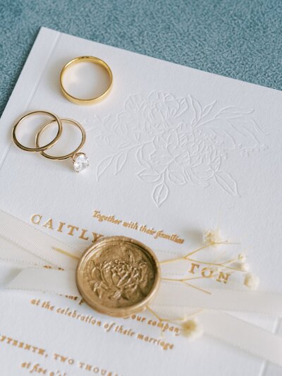 Wedding rings and wedding invitation