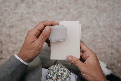 bride and groom rings detail intimate ceremony at borgo santo pietro 